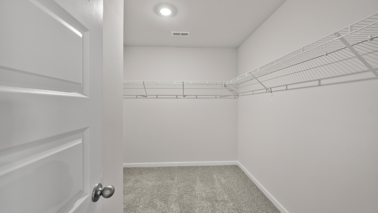 primary bedroom walk-in closet
