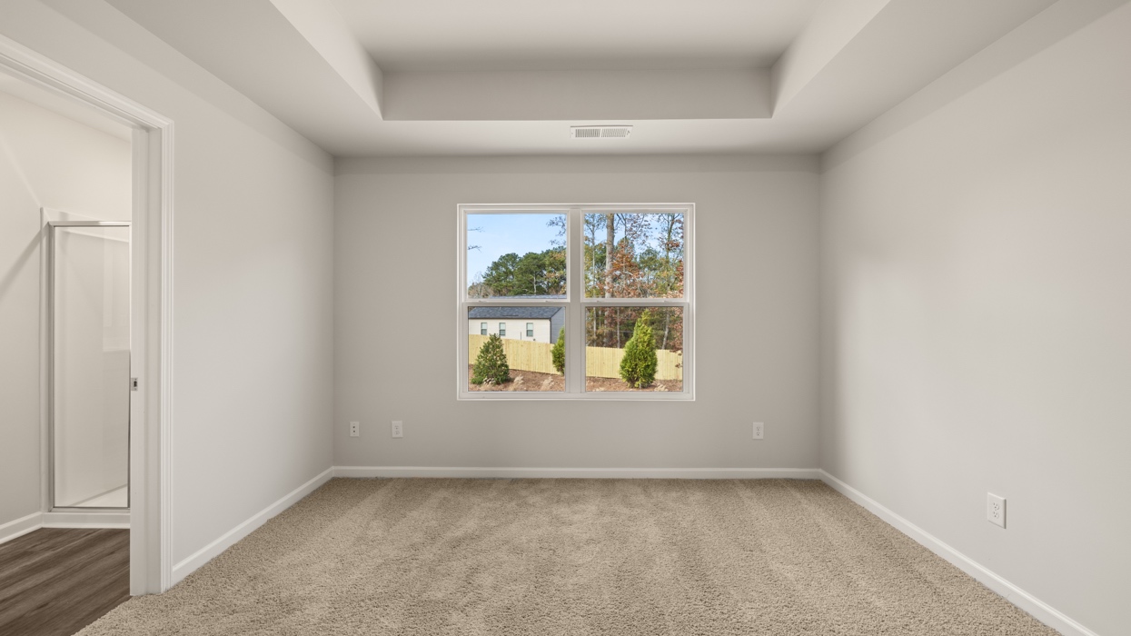 primary bedroom with natural light