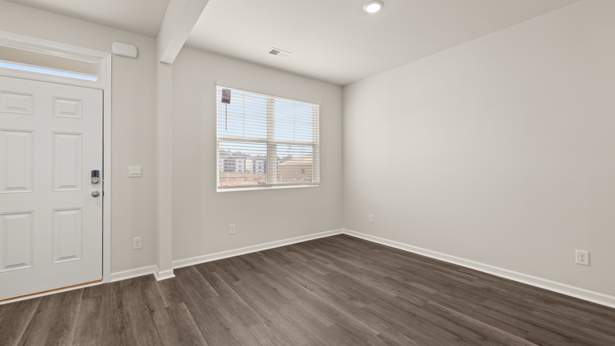 foyer and flex room with natural light