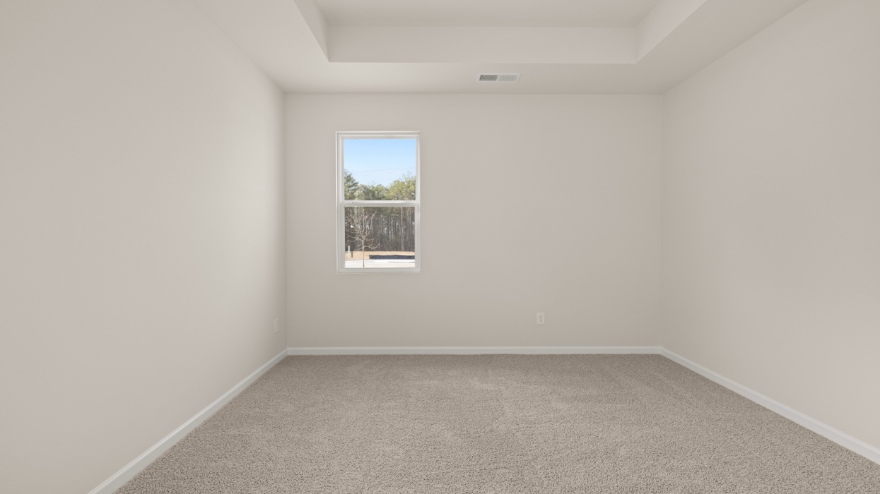 primary bedroom with natural light