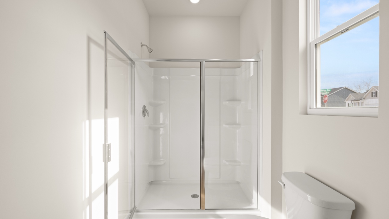 primary bathroom with walk-in shower