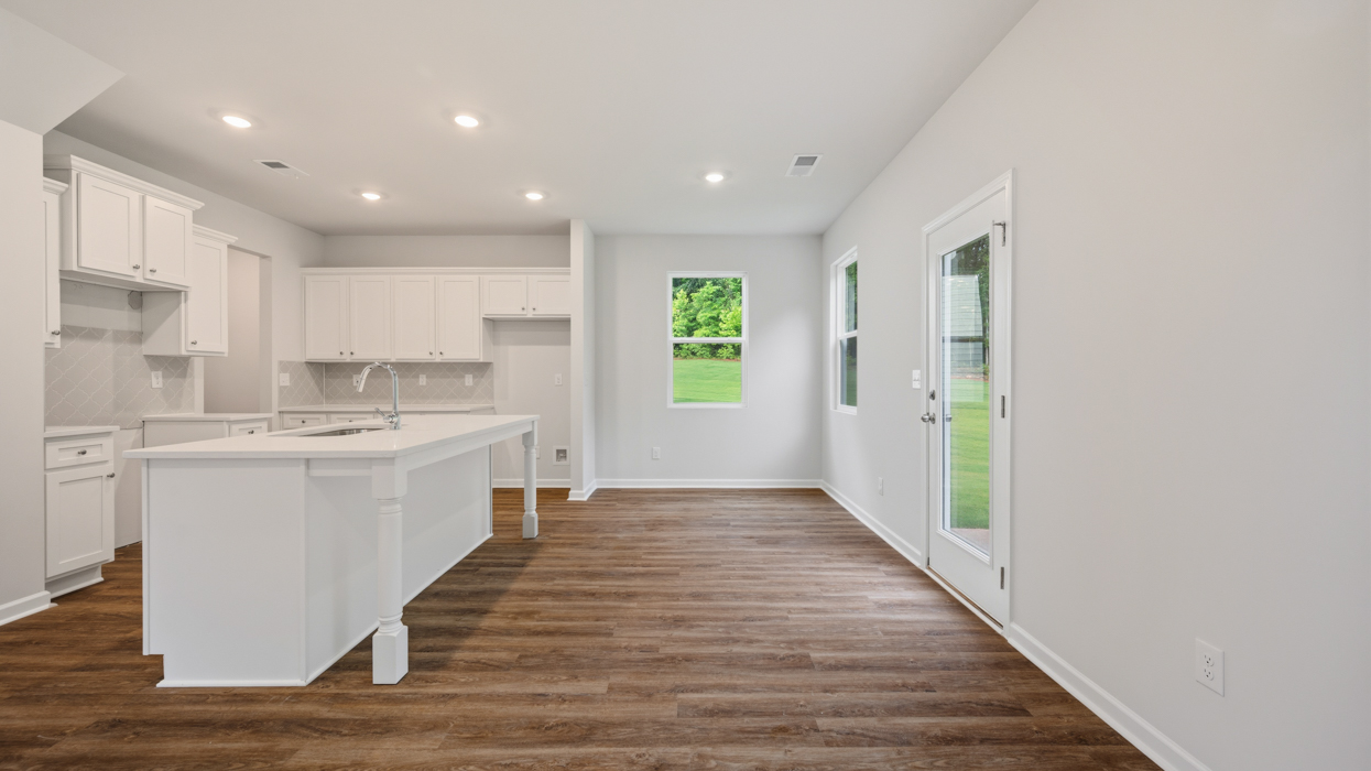 breakfast room with natural light and access to rear patio