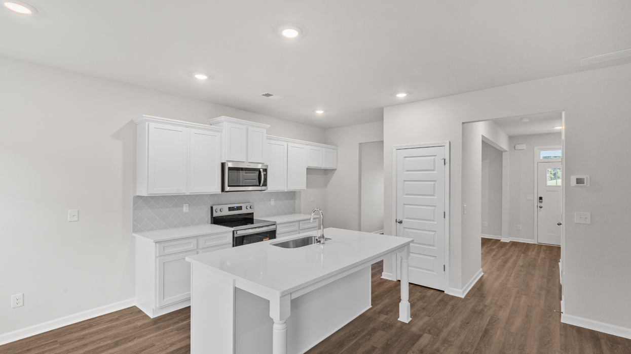 kitchen with view of kitchen island and stainless steel appliances