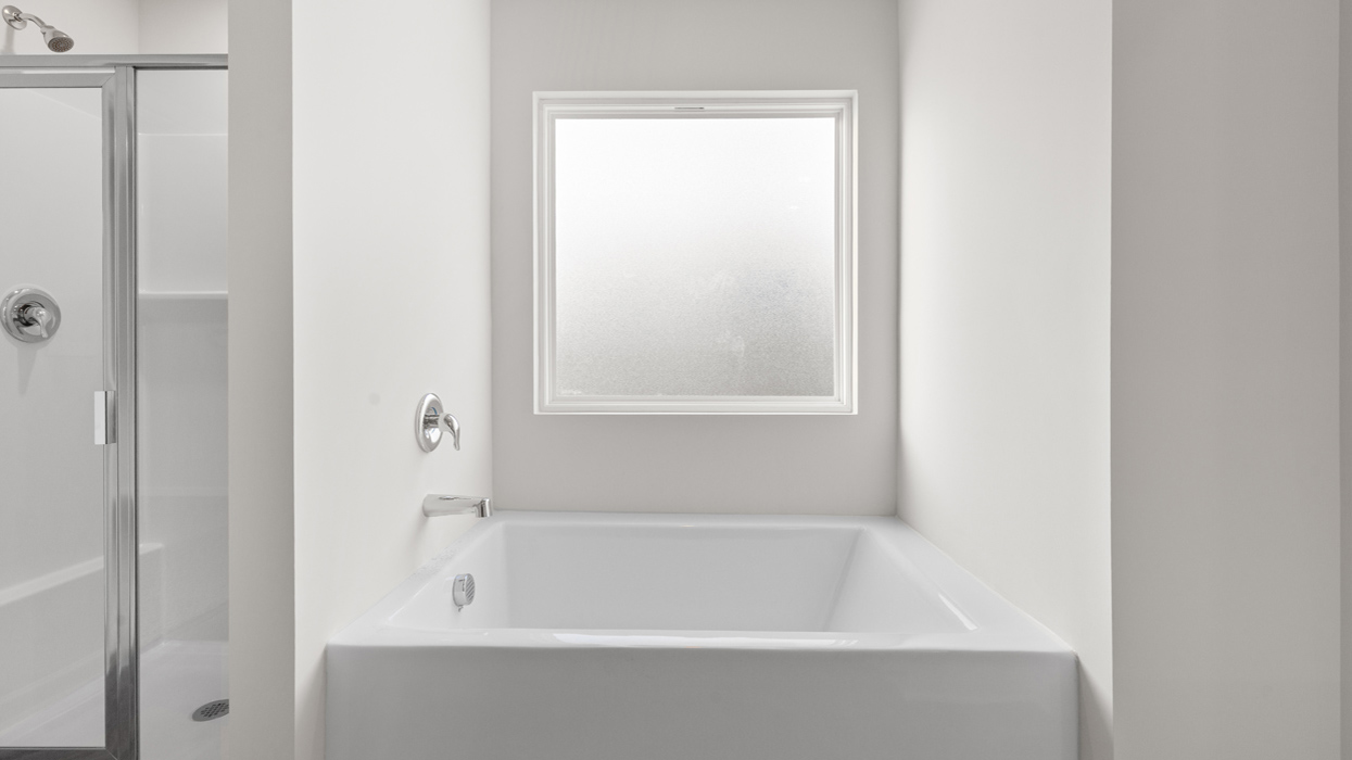 bedroom 1 bathroom with soaking tub`