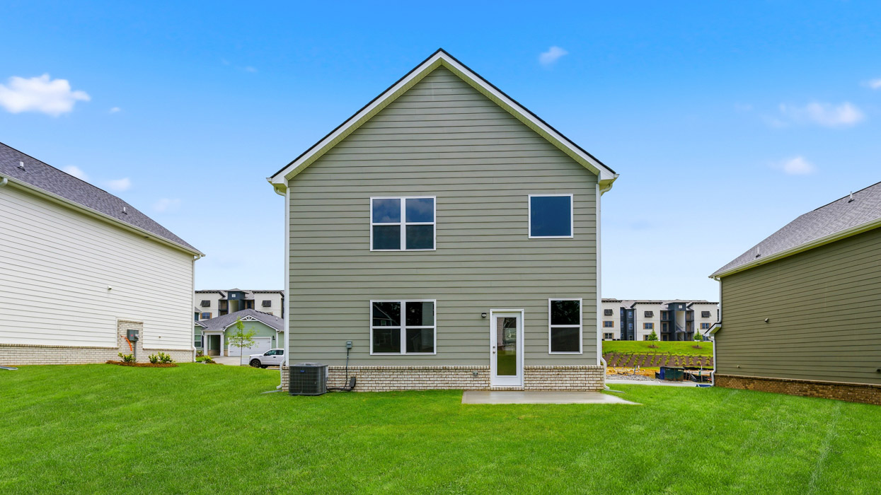 Live exterior back with siding and patio