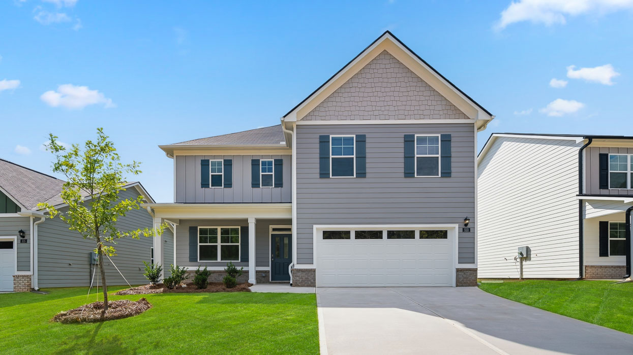 Two Story two car garage with covered porch