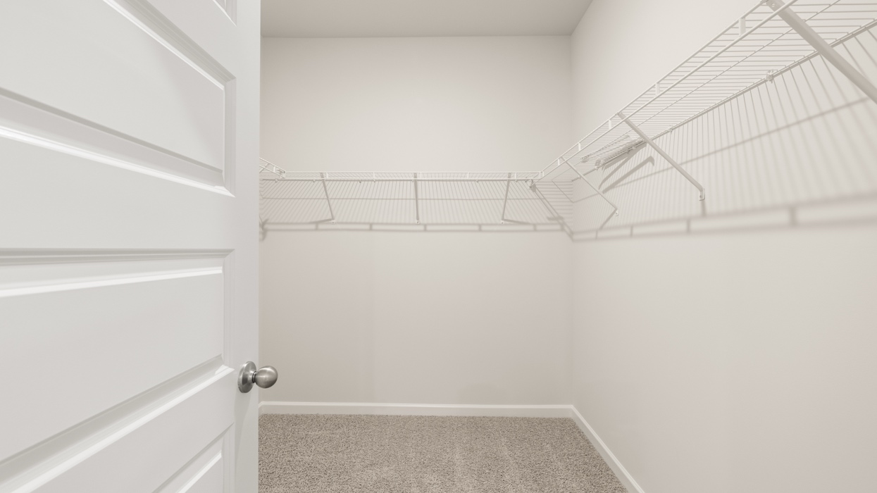 bedroom 1 closet with wired shelves