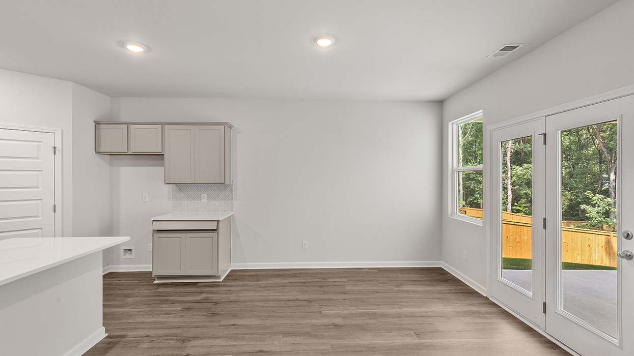 breakfast room with access to rear patio and natural light