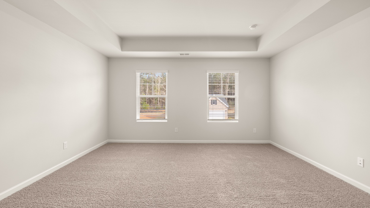 primary bedroom with abundance of natural light