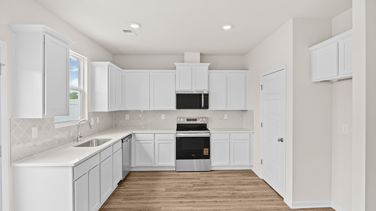 kitchen with spacious gray cabinetry