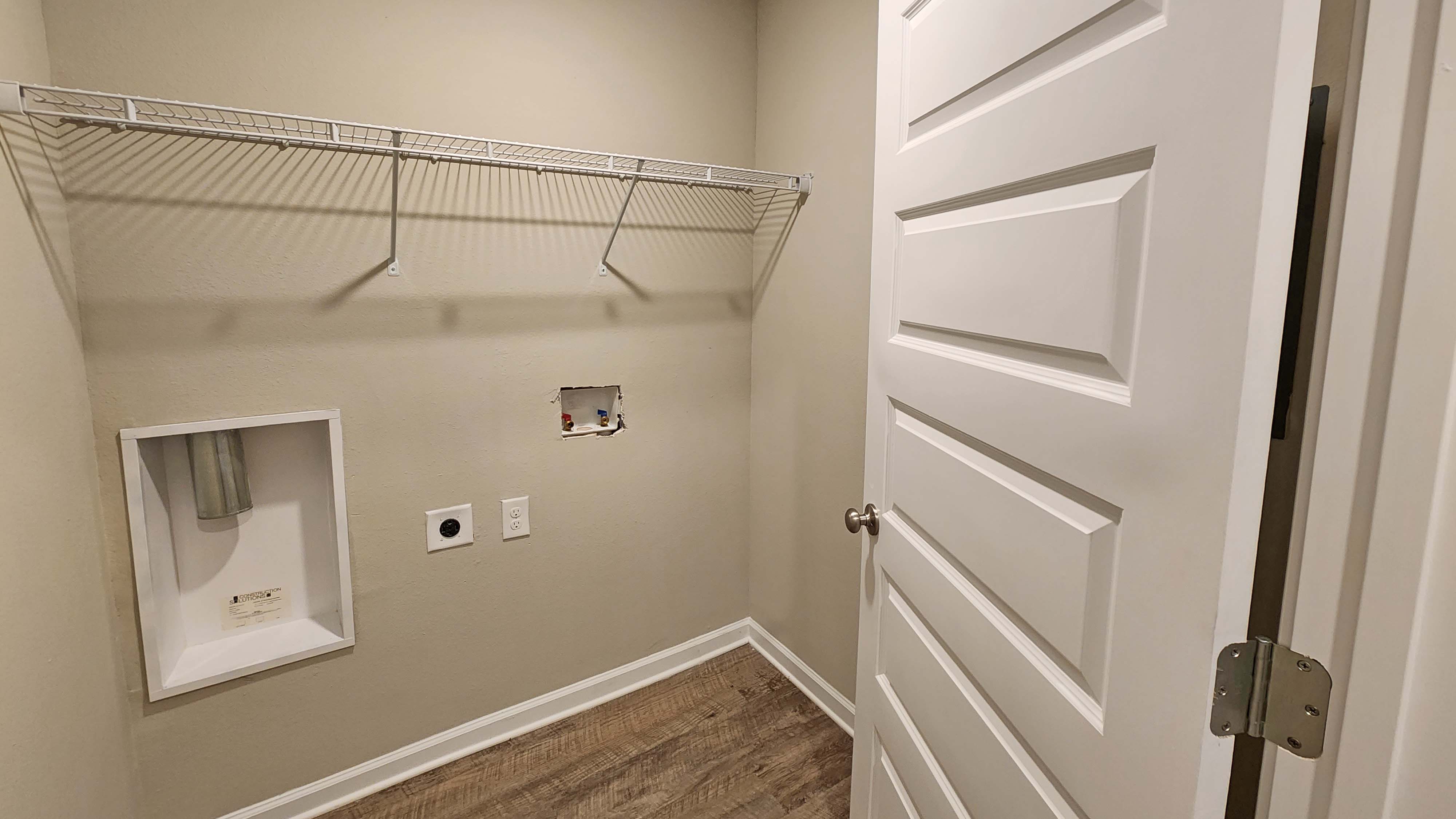 Laundry room inside the Aria
