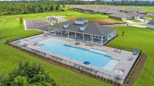 Aerial view of the pool and clubhouse at Heritage Lake by D.R. Horton.
