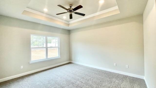 Primary bedroom in a new home.