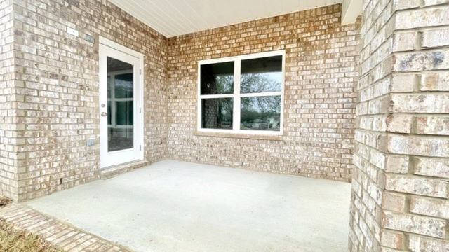 Covered porch perfect for outdoor entertaining on the Al Coast.
