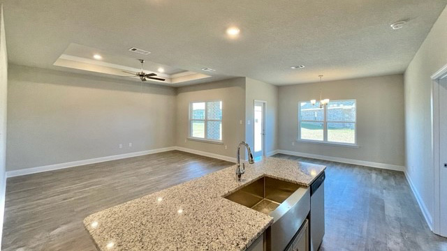 View into living area over kitchen island.
