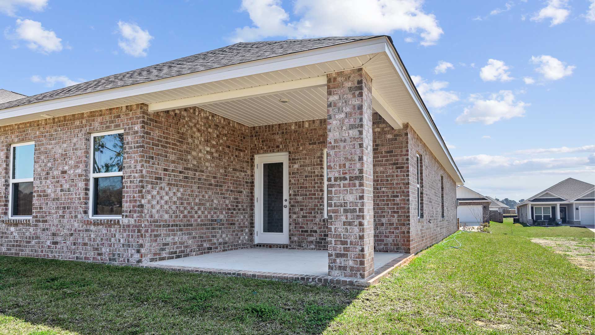 Rear covered porch of an Oakley floorplan