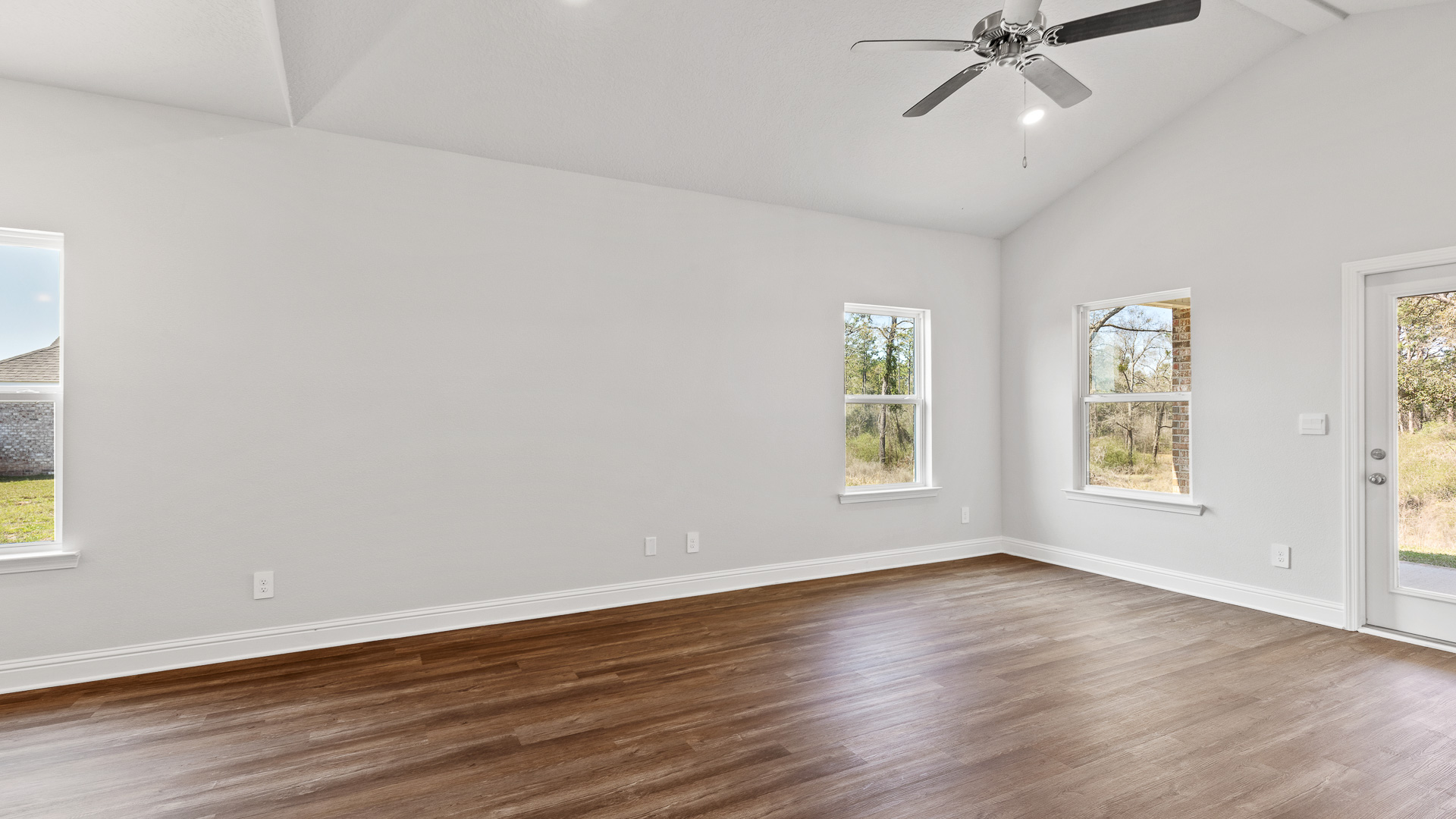 Great room in an Oakley floorplan in a Mobile County new home community.