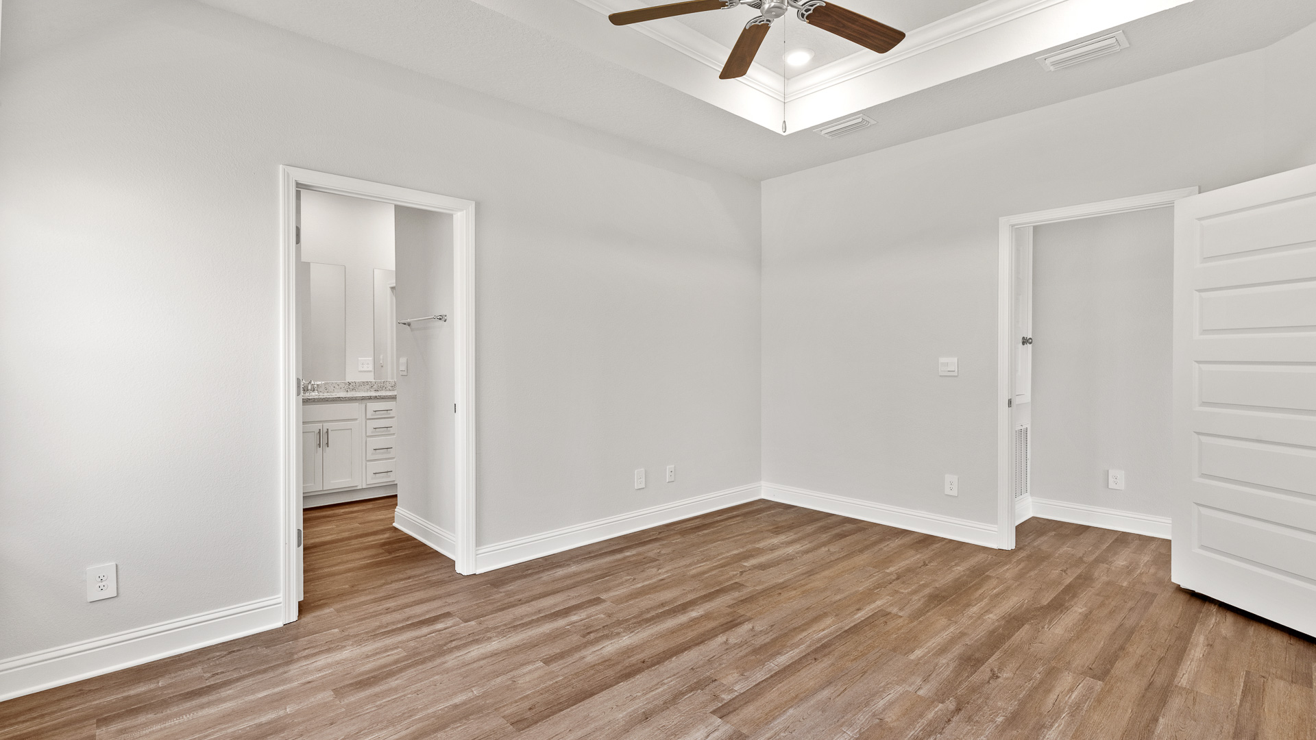 Primary bedroom in a new home in Mobile, Al.