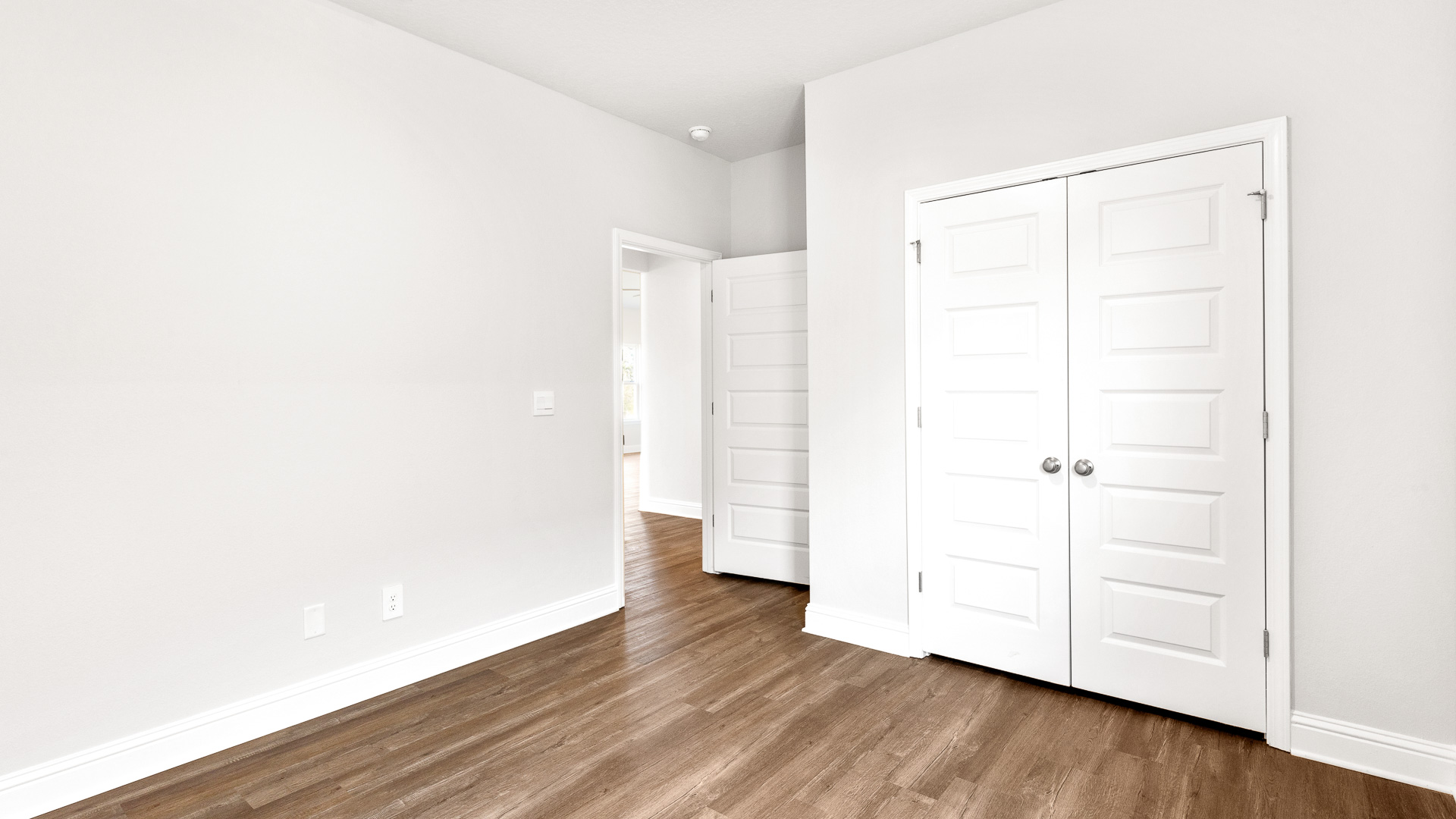Guest bedroom in a new home in Mobile, AL.