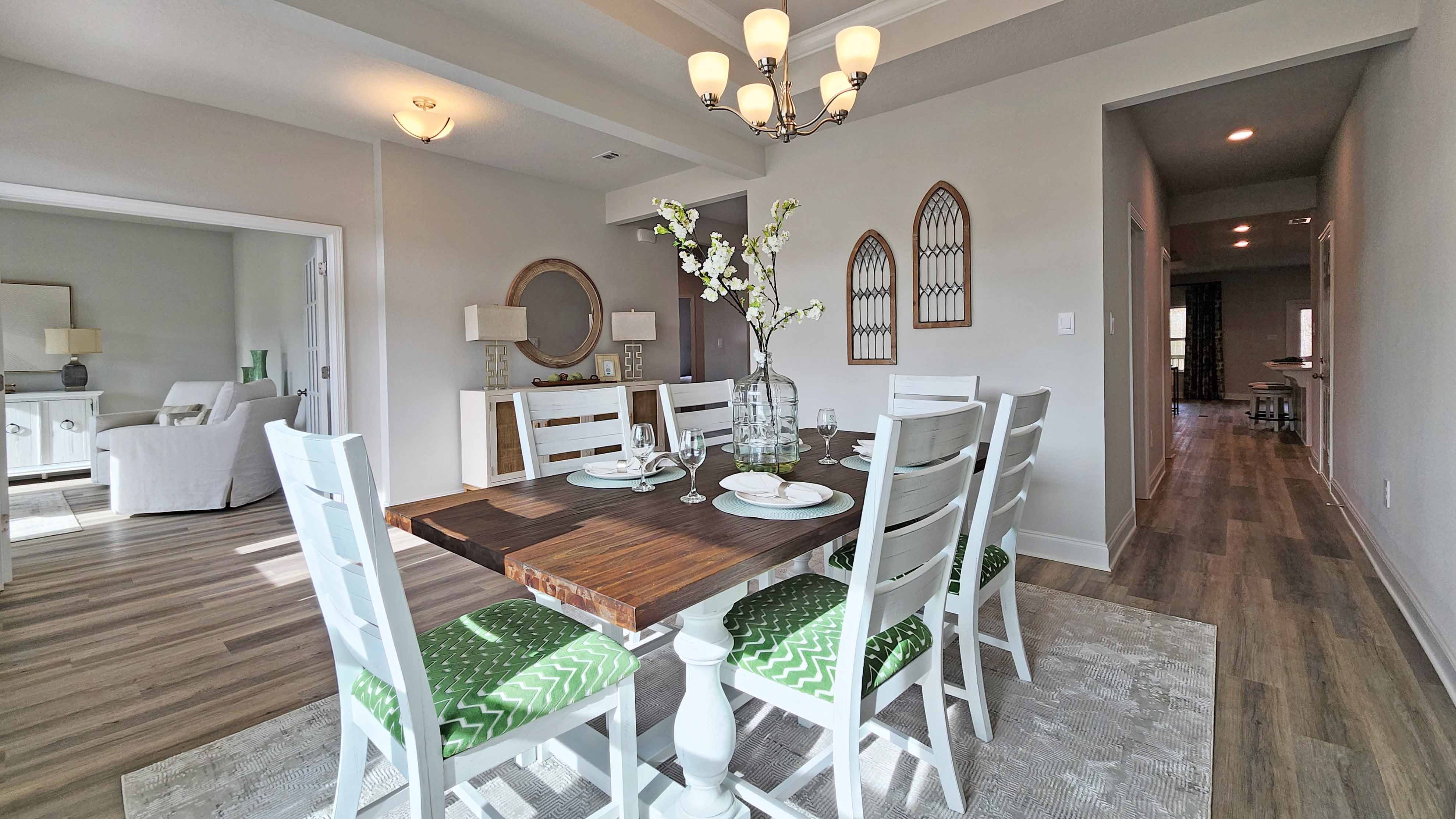 Front dining room with large window. Front dining room with large window.