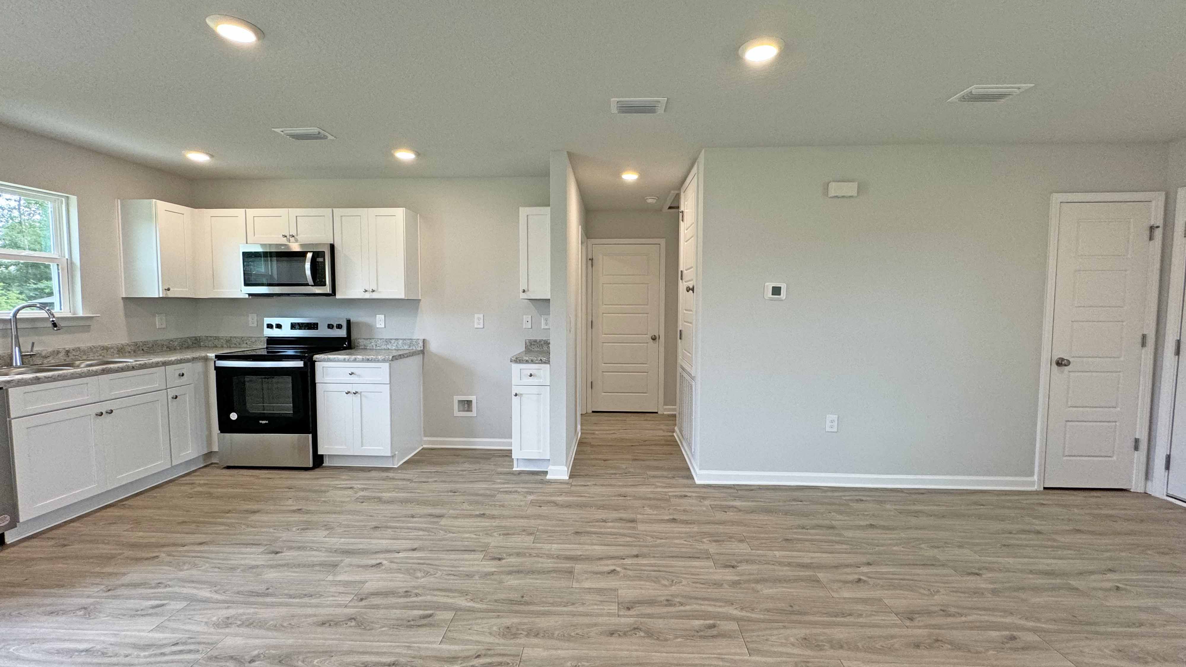 The Allanton kitchen with shaker-style cabinets at Oakmont Place.