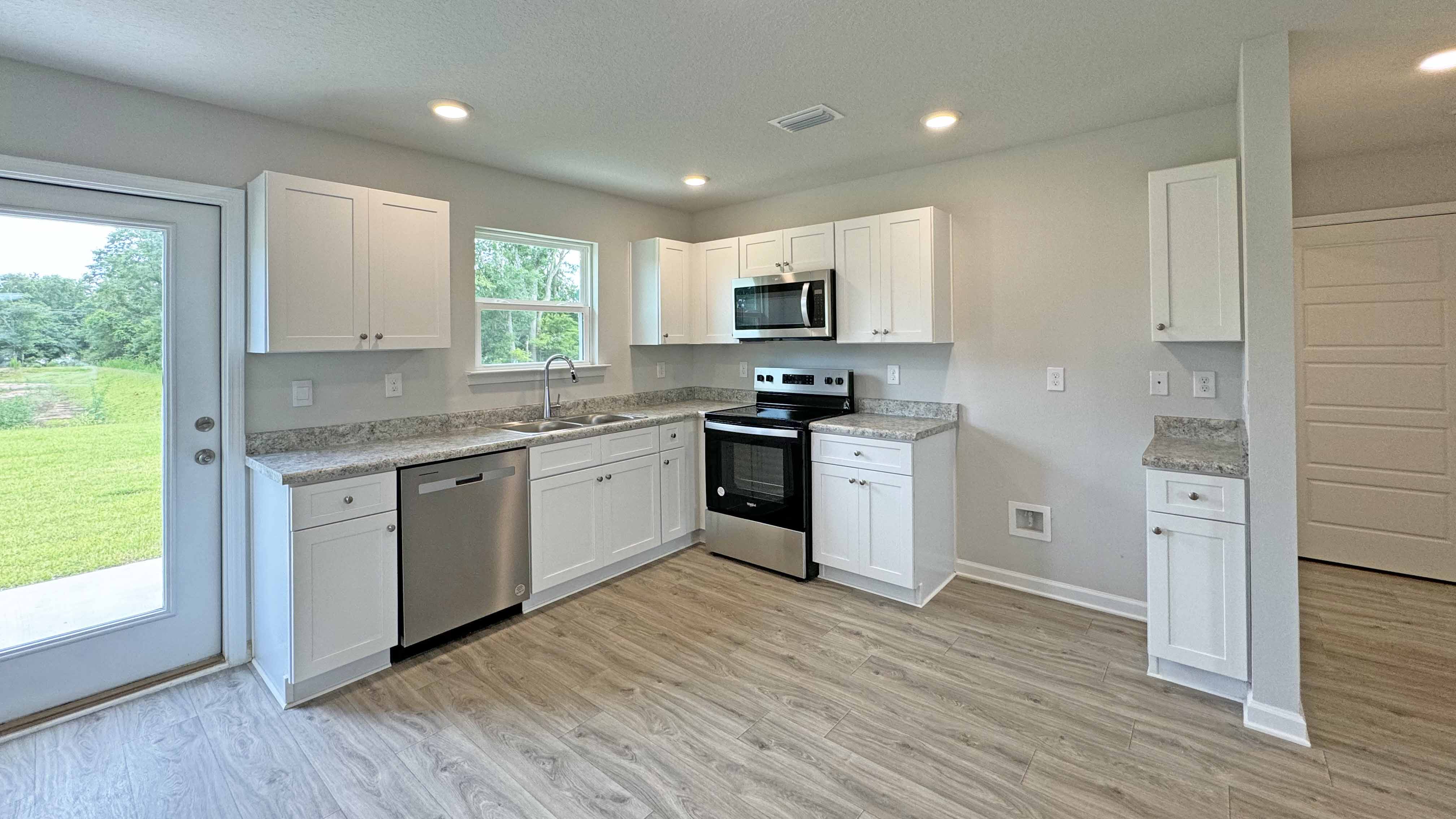 The Allanton kitchen with shaker-style cabinets at Oakmont Place.