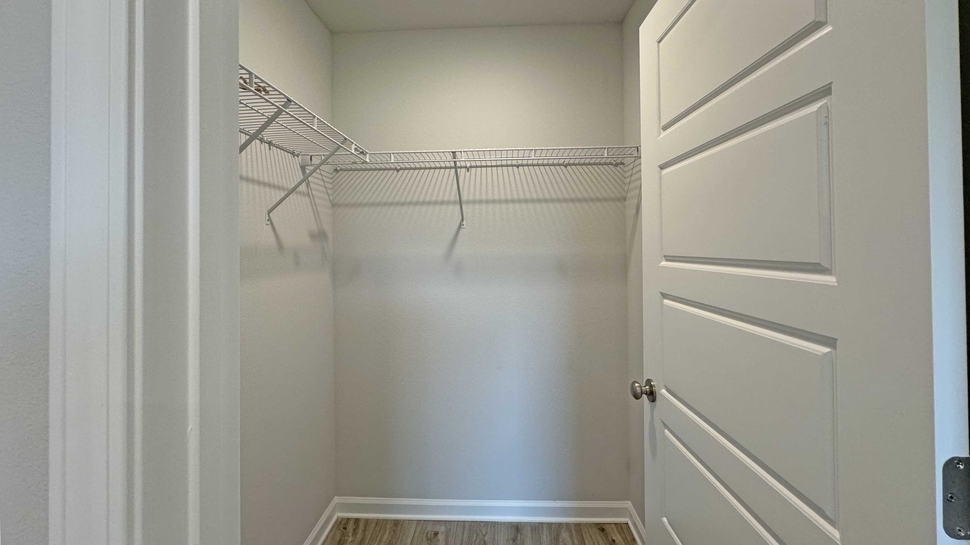 The Allanton bedroom's walk-in closet at Oakmont Place.