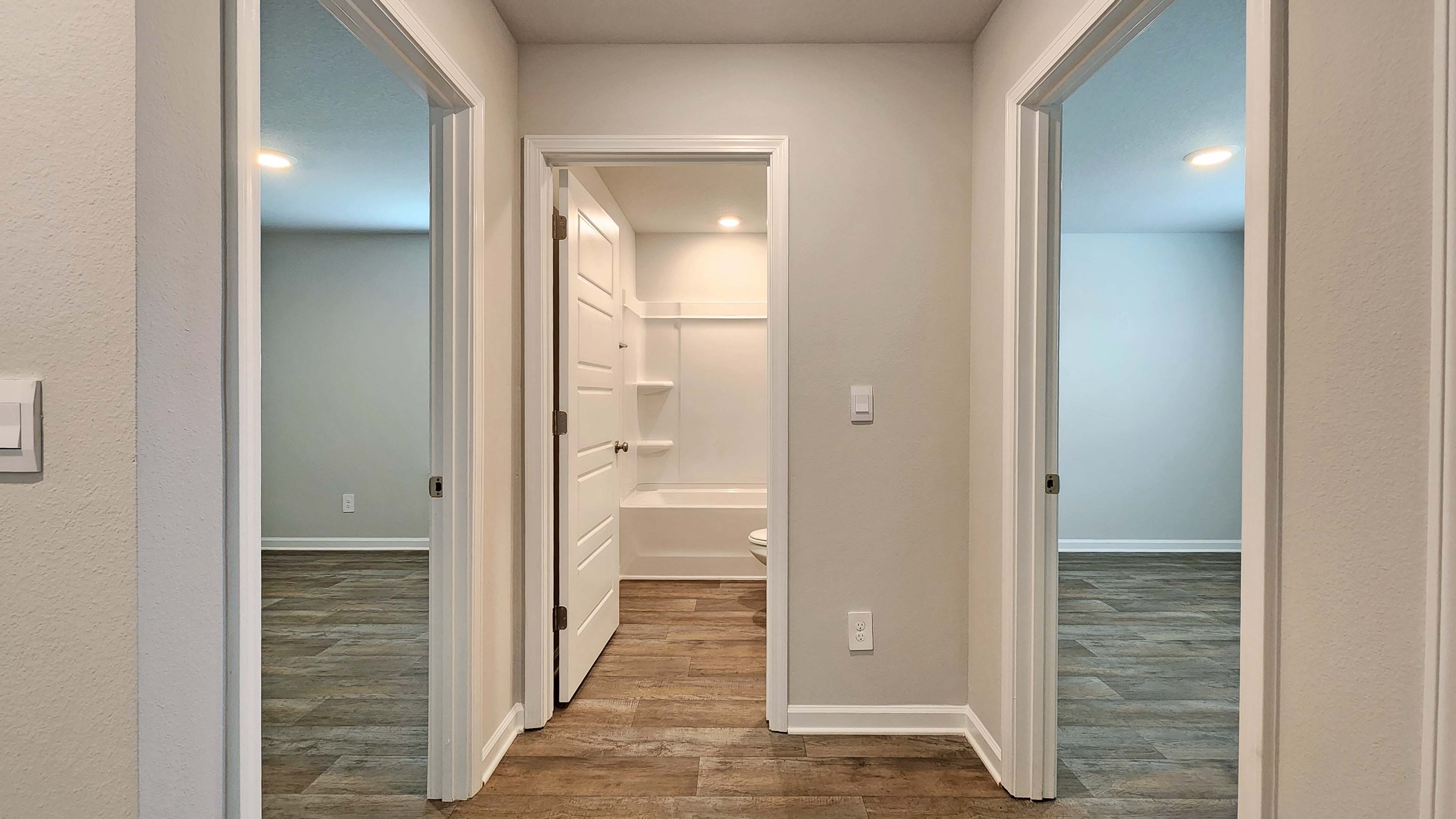 The Sullivan guest bath with two bedrooms on either side.
