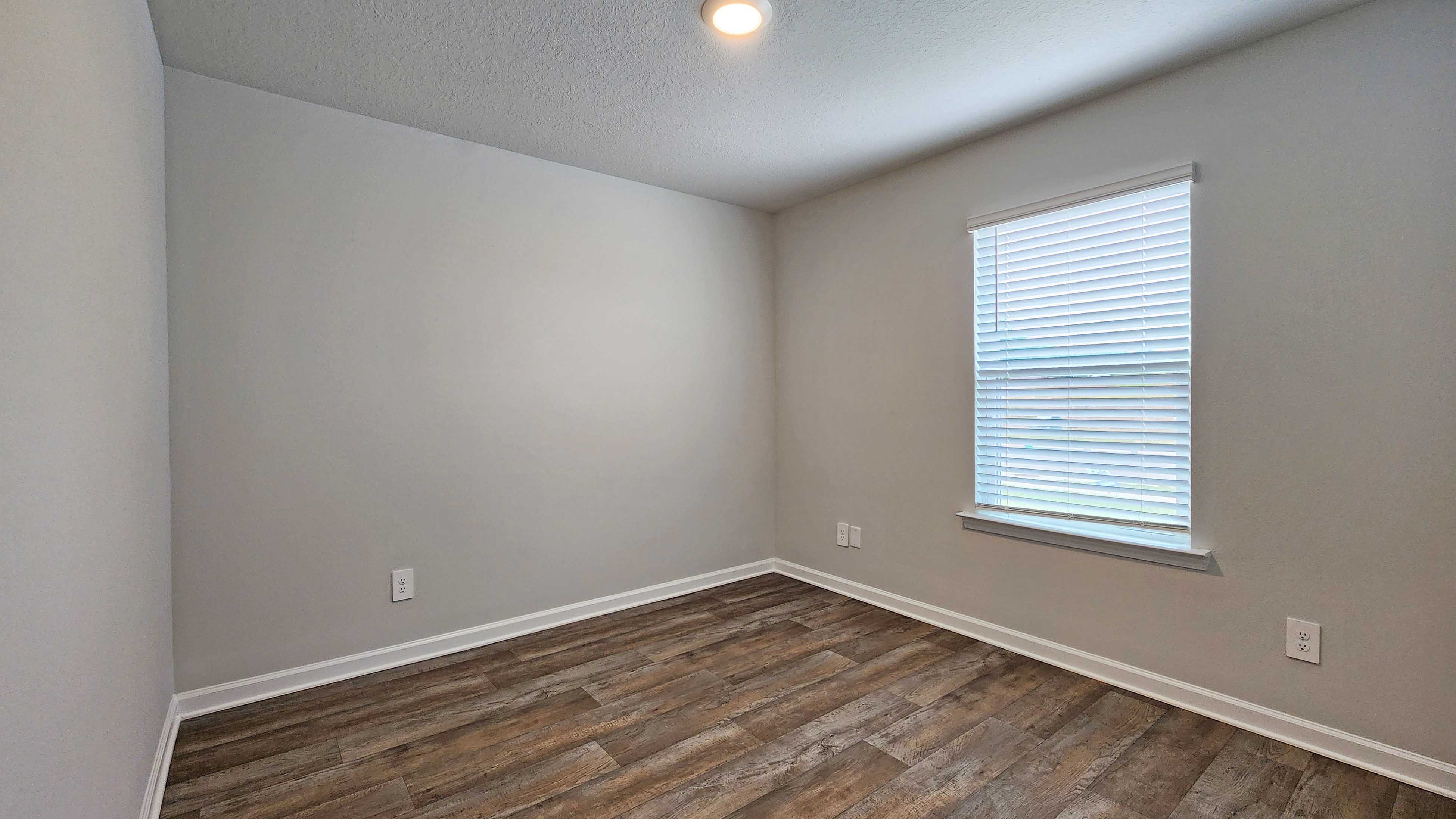 Sullivan bedroom with window..