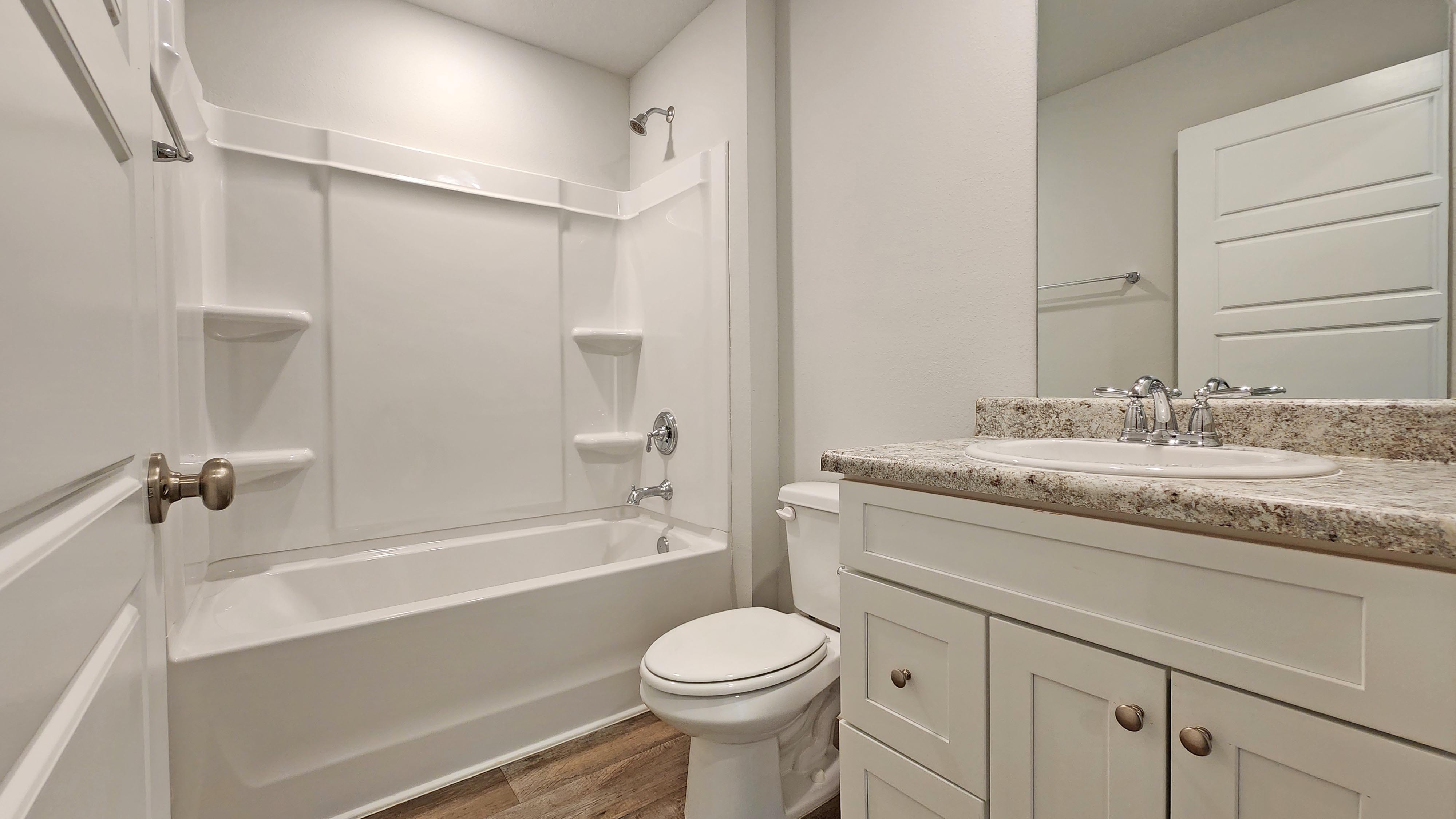 The Sulivan bathroom with shower/tub combination.