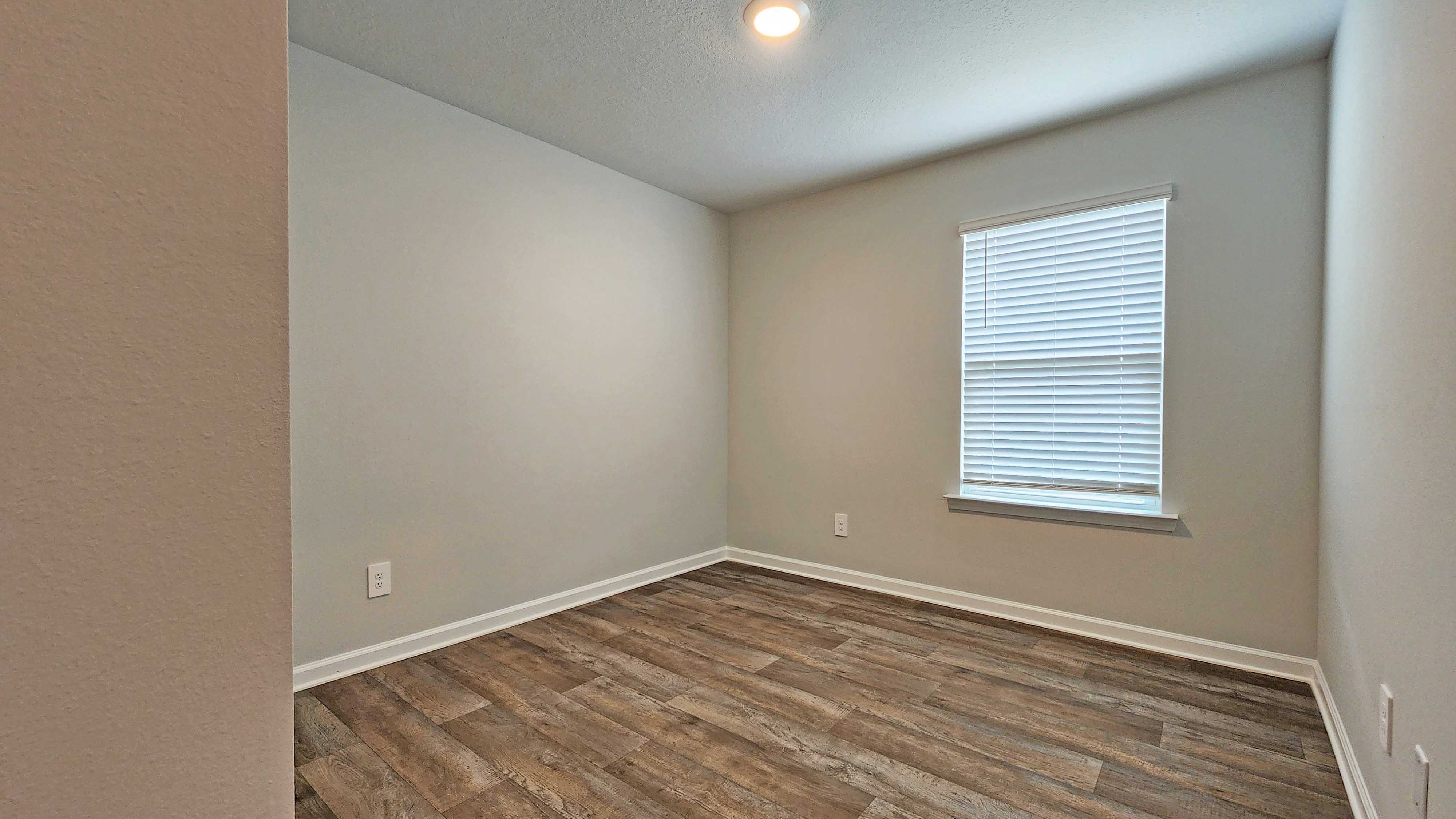 Sullivan bedroom with window..