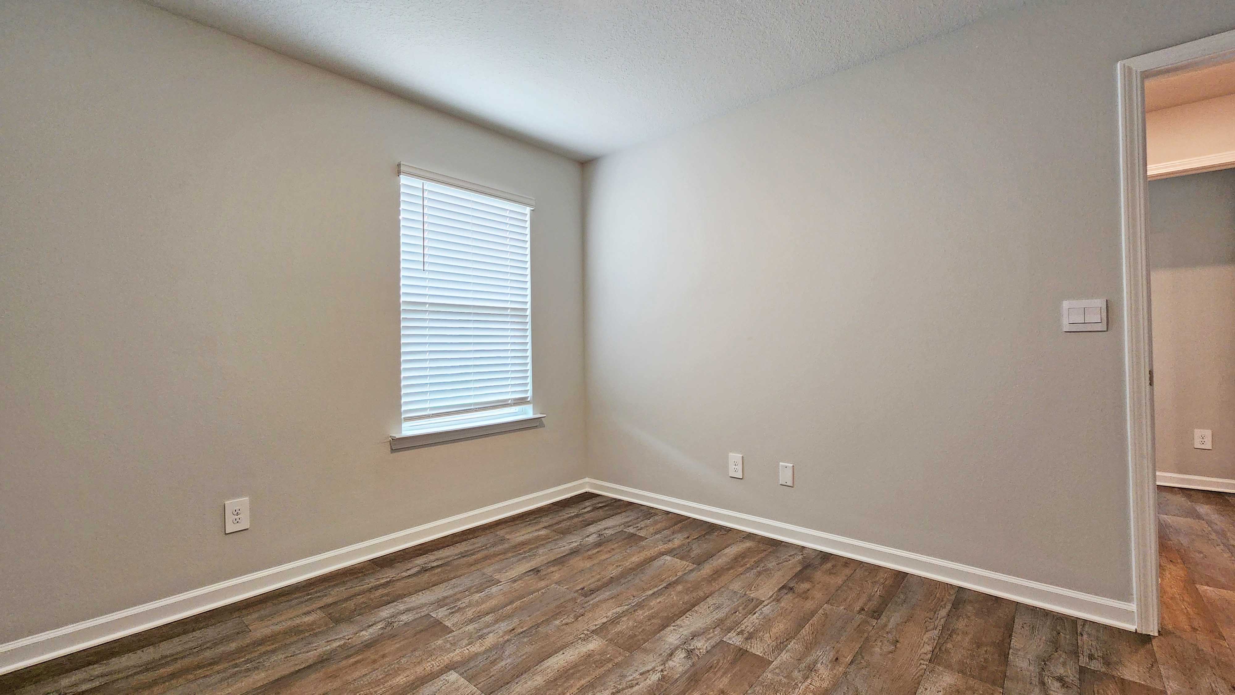 Sullivan bedroom with window..