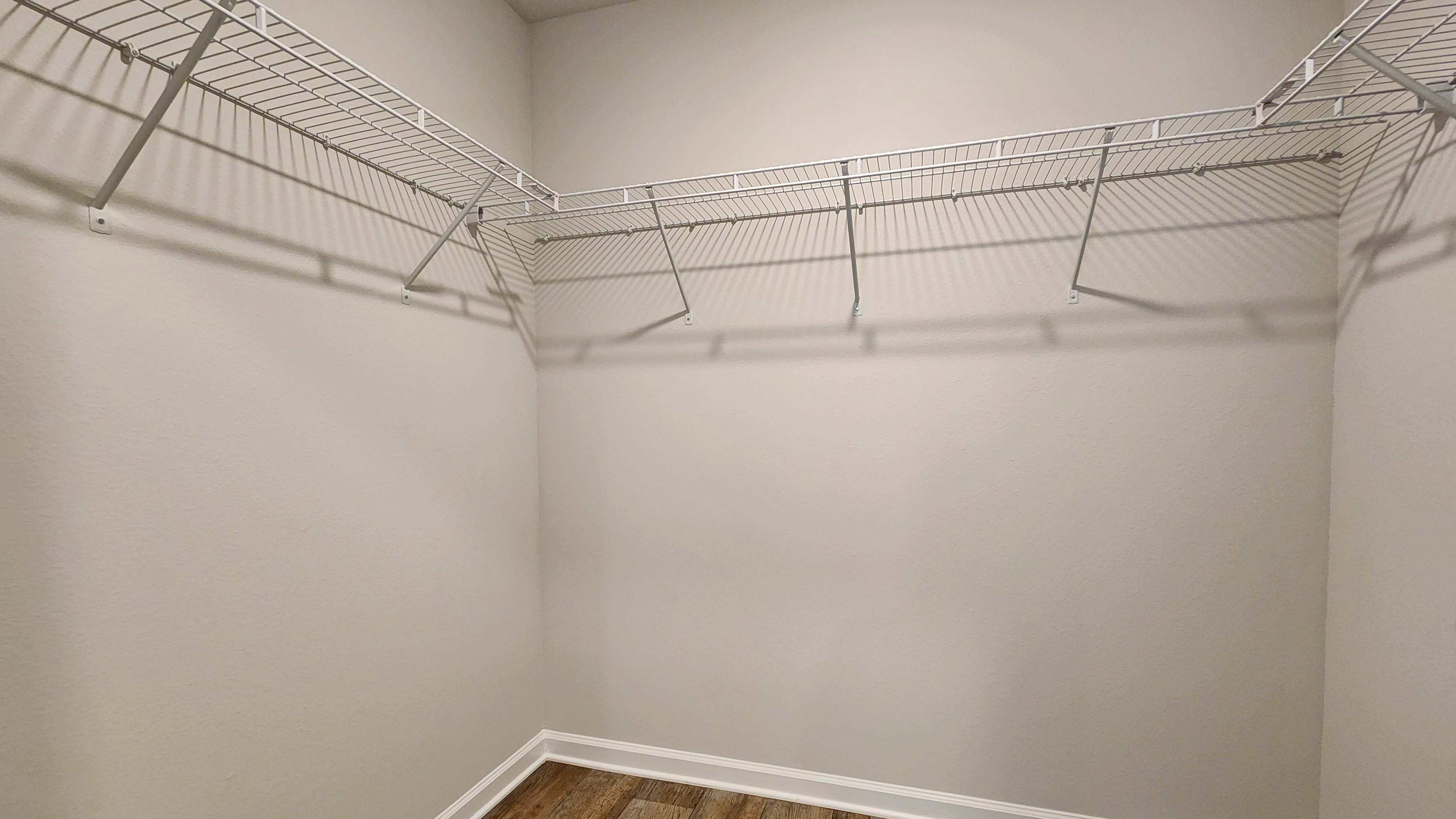 The primary walk-in closet at the Sullivan.