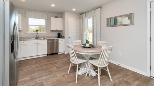 Another angled view of the kitchen from the hallway.