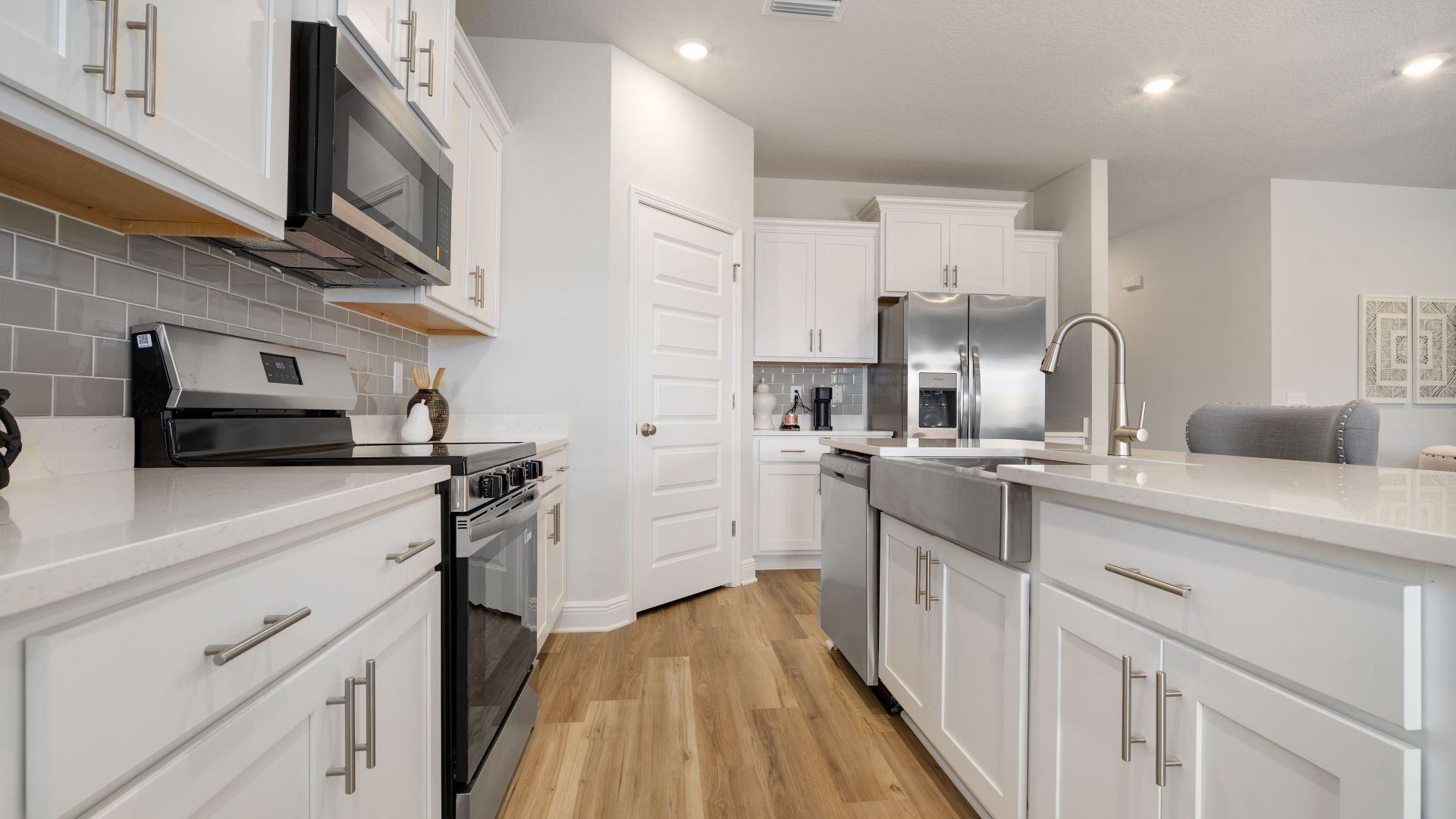 Large kitchen with stainless steel appliances