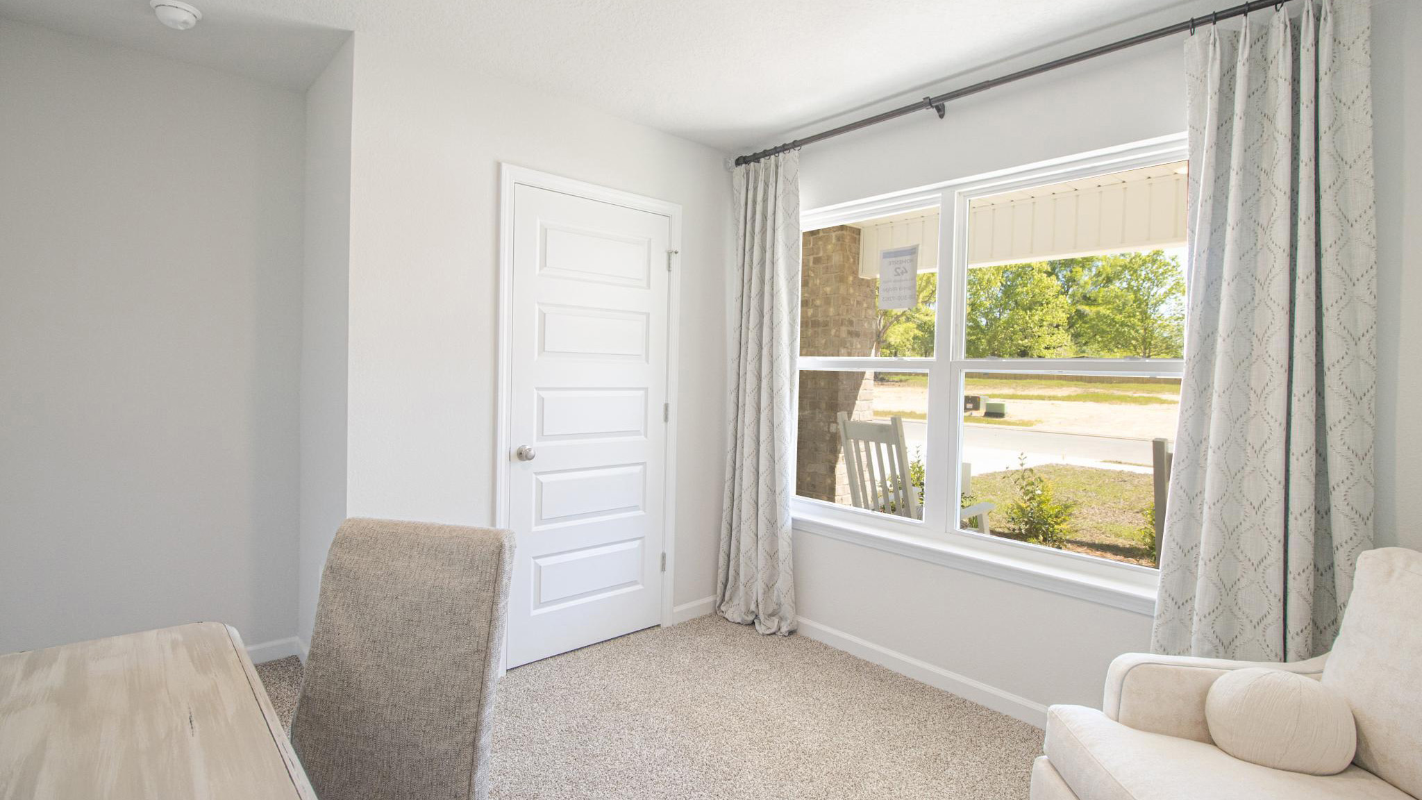 Front bedroom/study with window.