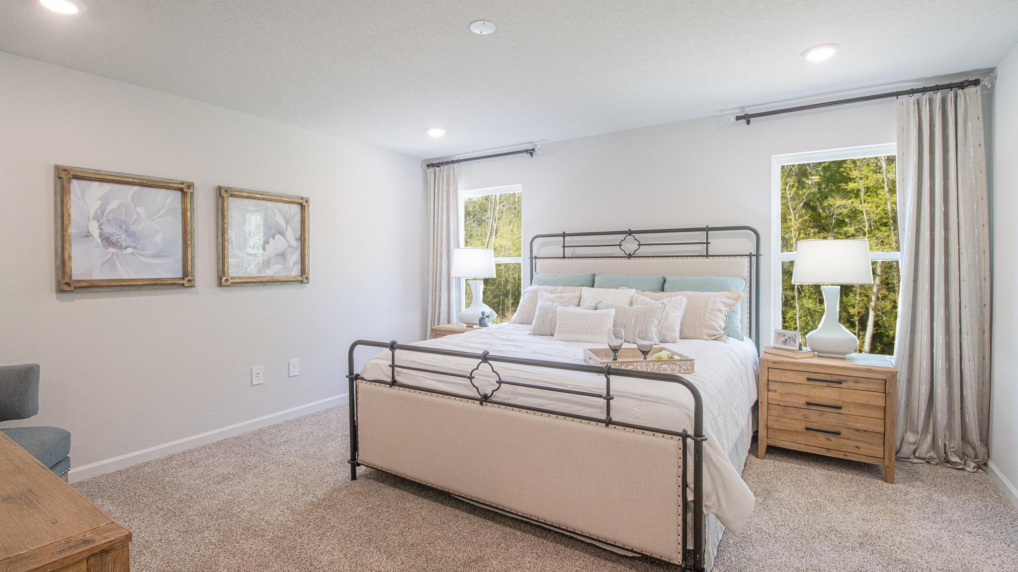 Primary bedroom with windows.