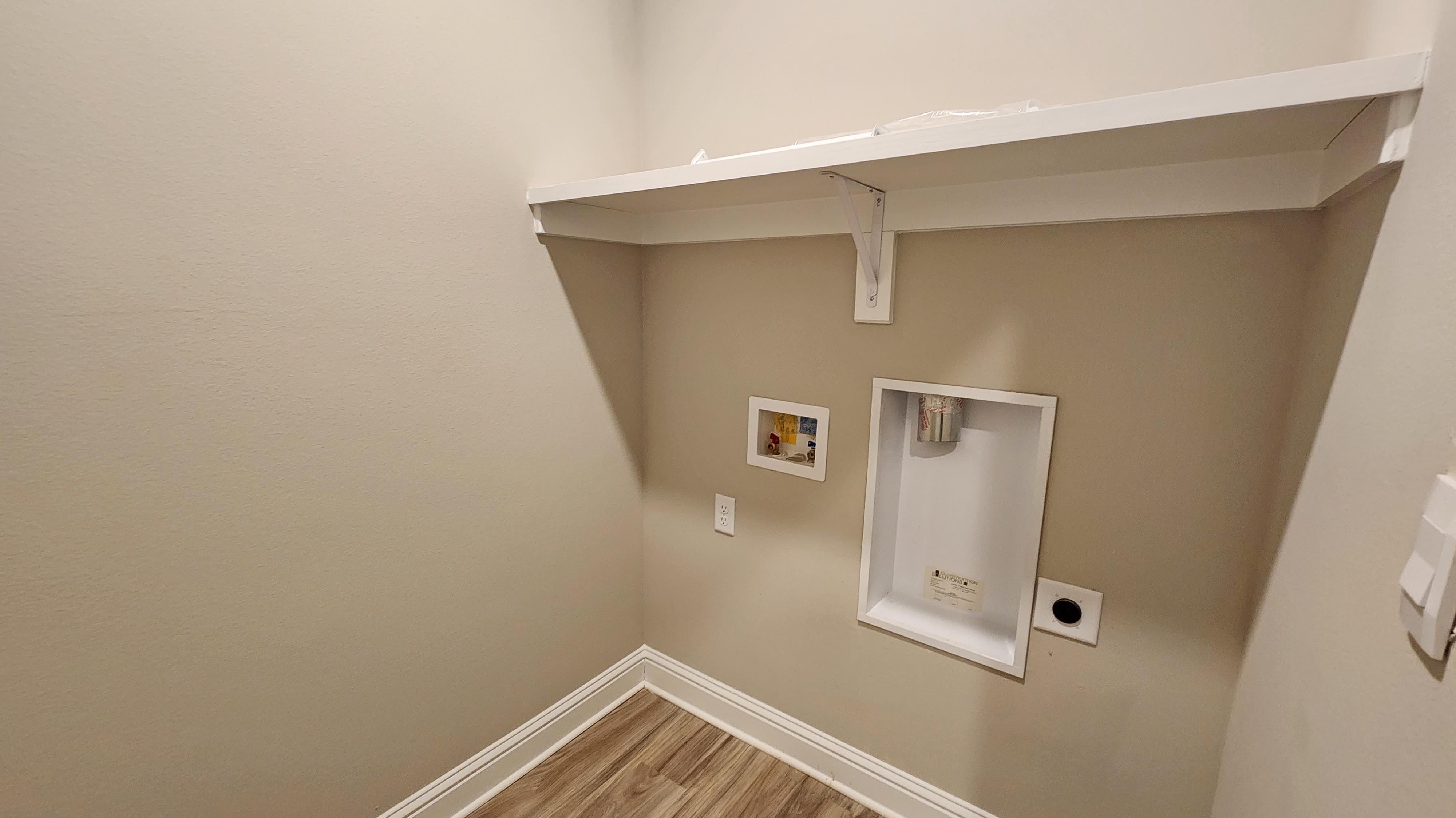 The Avery laundry room at Hamilton Ridge.