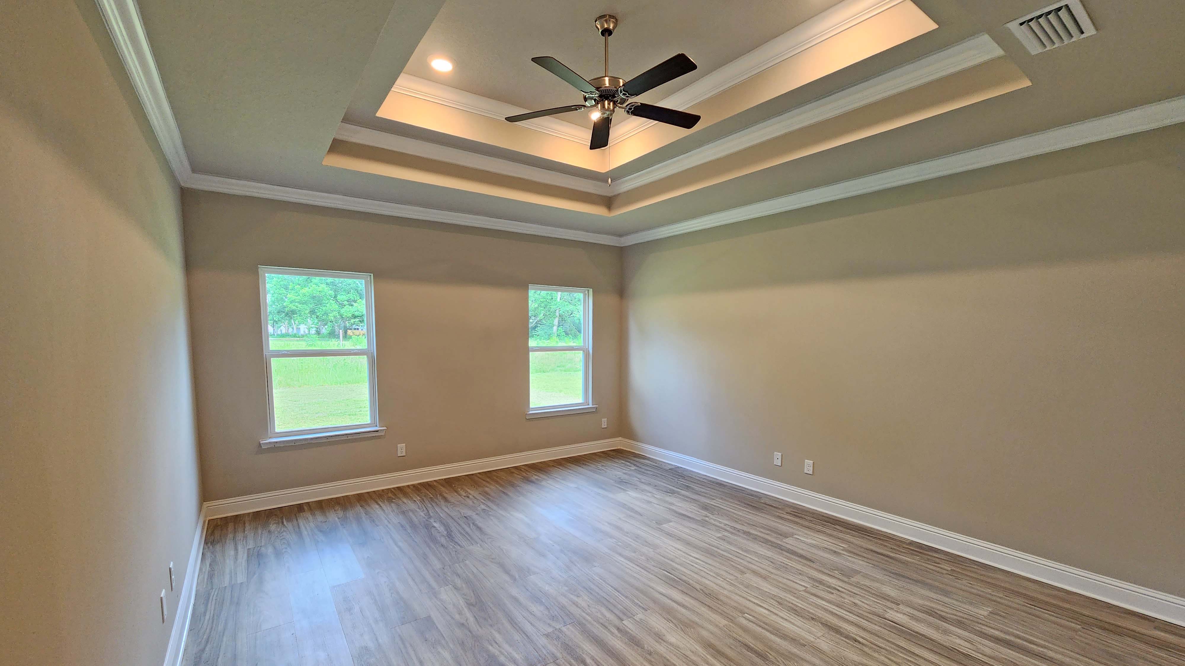 The Avery primary bedroom at Hamilton Ridge.