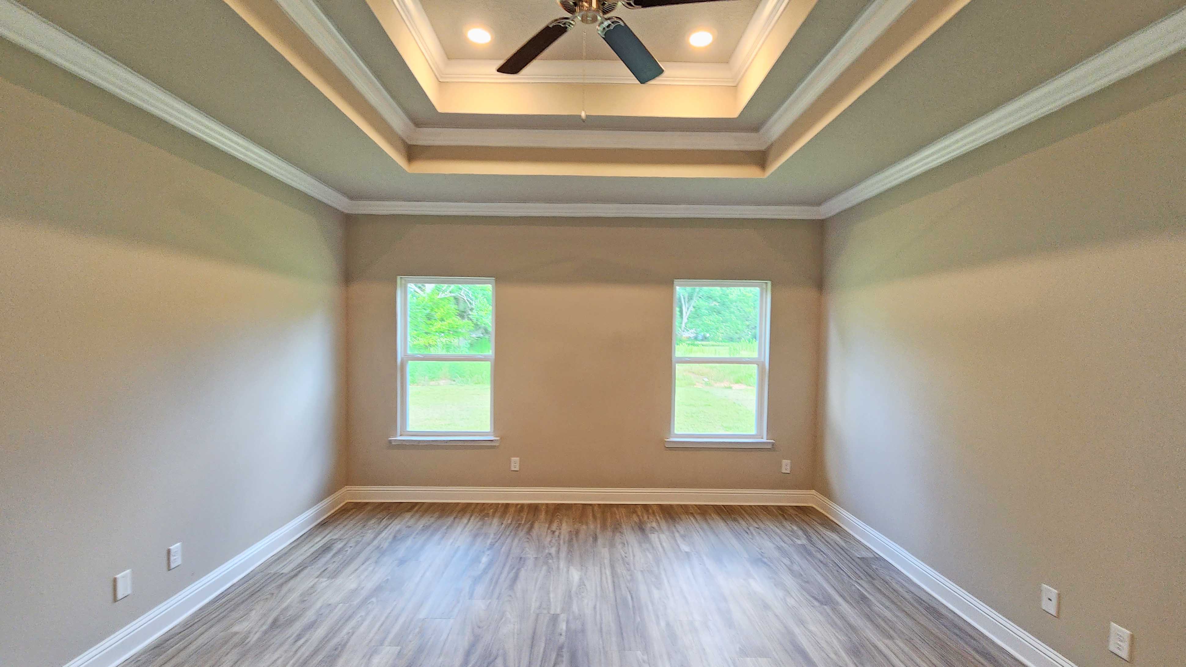 The Avery primary bedroom at Hamilton Ridge.