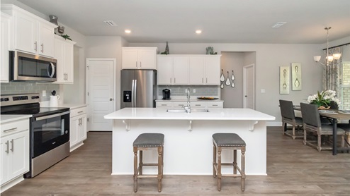 View of the counter space and leg space inside the Katherine kitchen.
