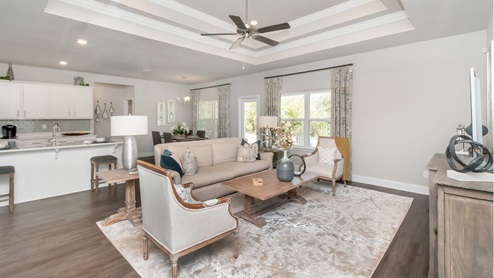 View of kitchen, breakfast nook, and living area.