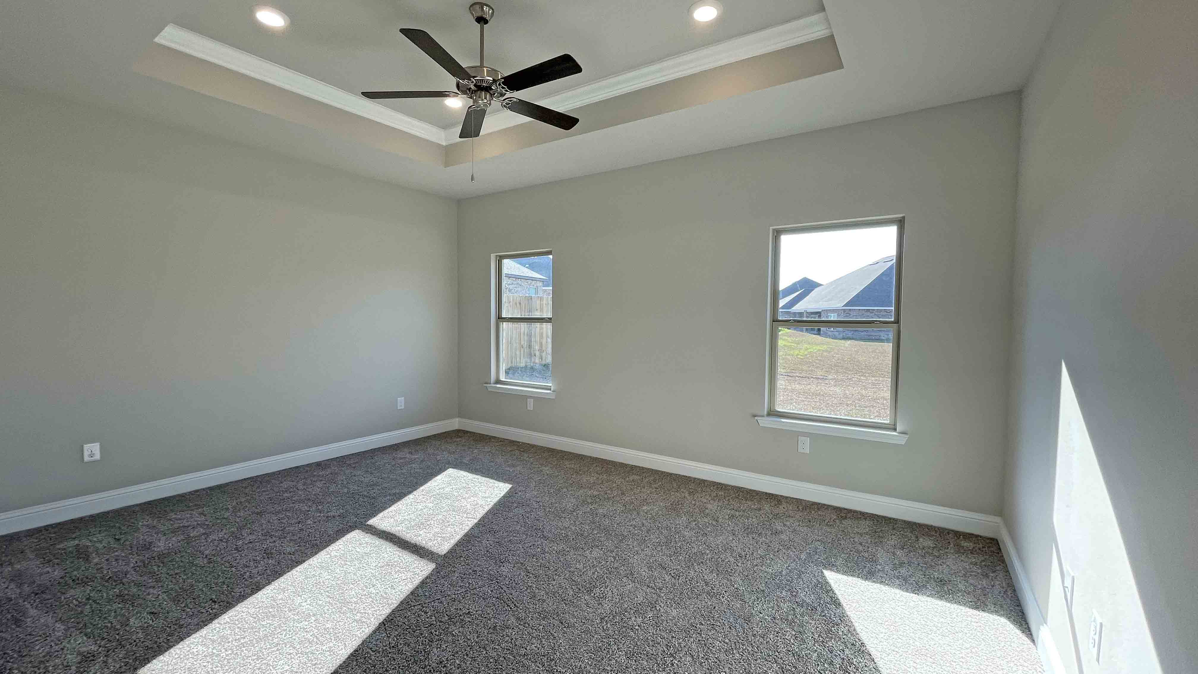 The Jasmine primary bedroom at Hamilton Ridge.