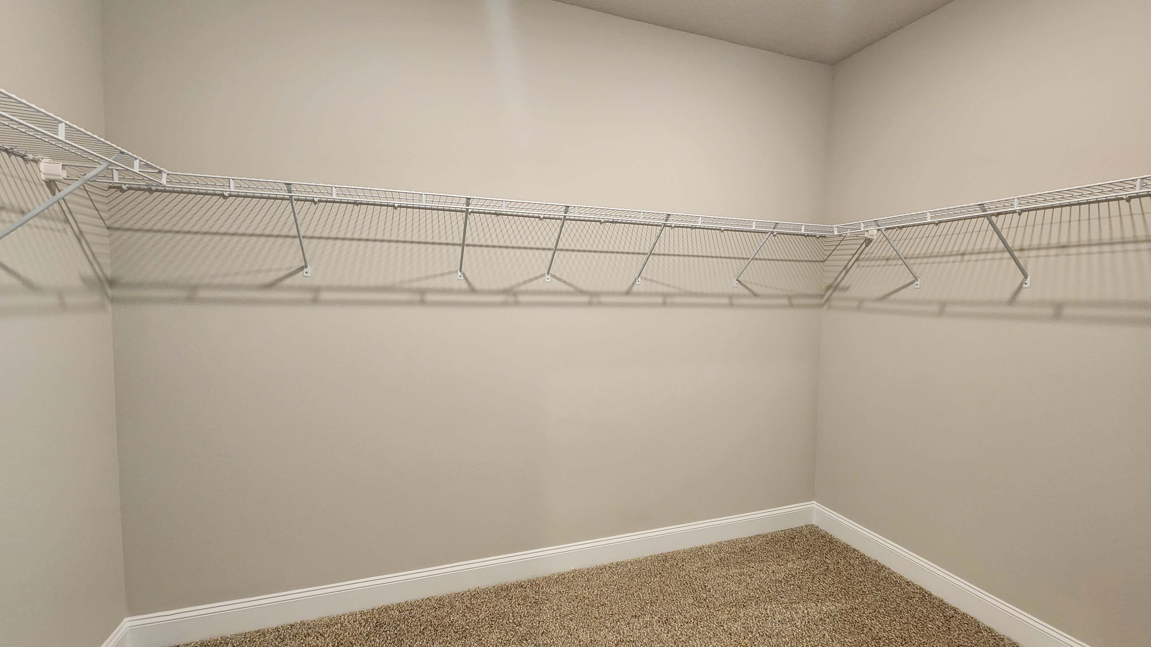 The Katherine primary walk-in closet at Hamilton Ridge.