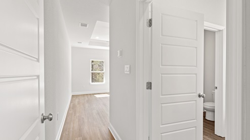 Bright and airy entrance to primary suite