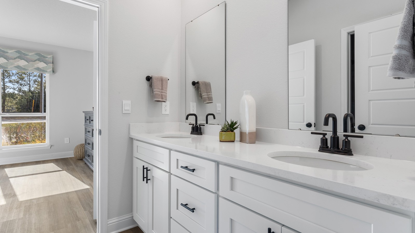 Sleek and spacious guest bathroom.