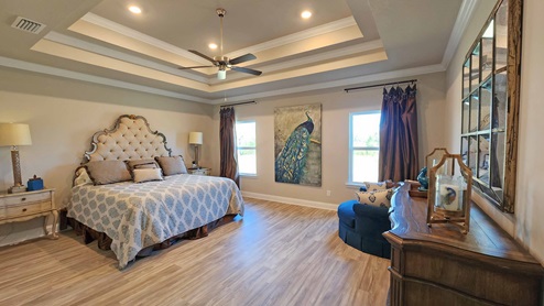 Primary bedroom in model home - Kingston Plan