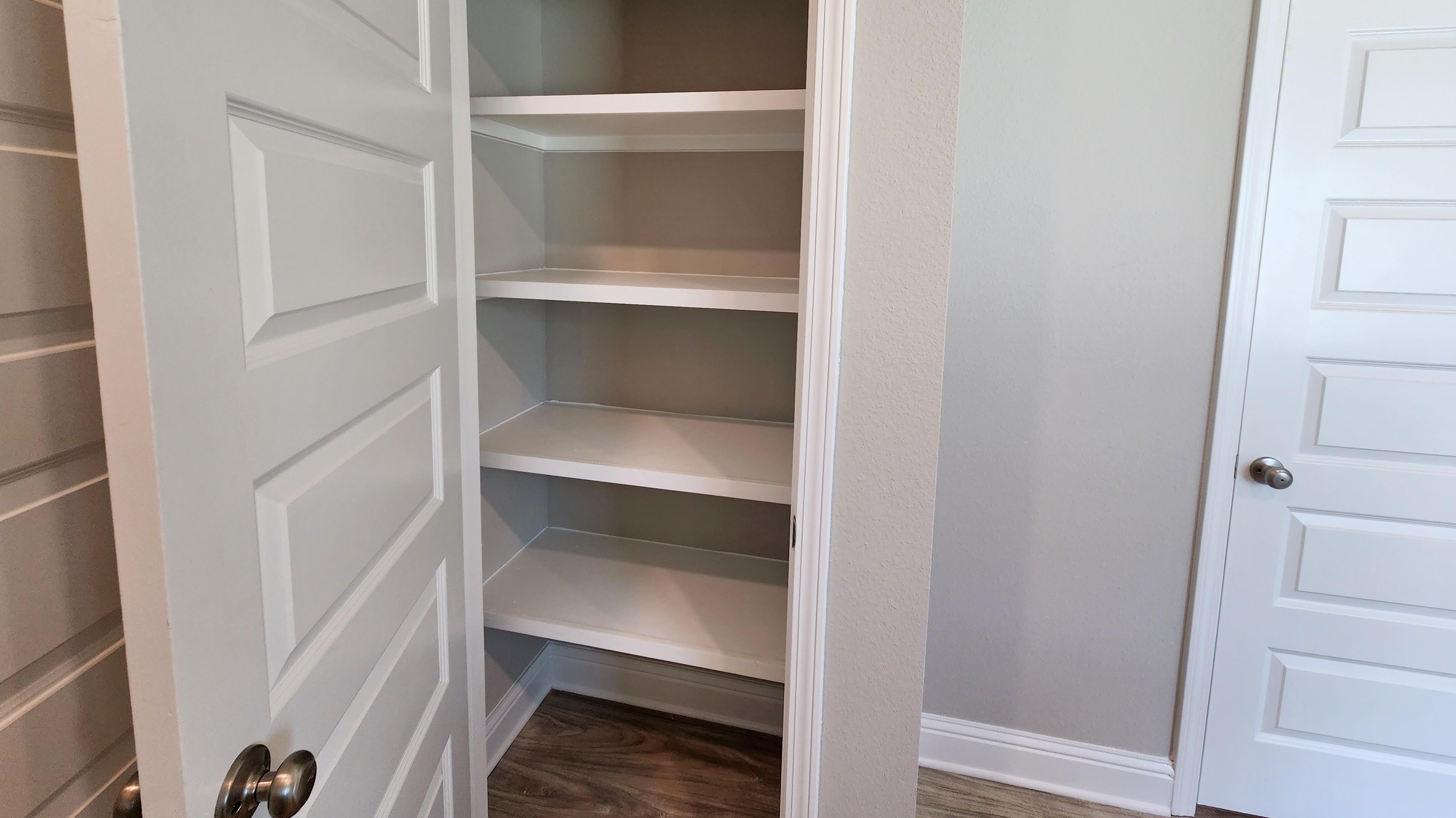 Luxurious towel closet inside the McKenzie
