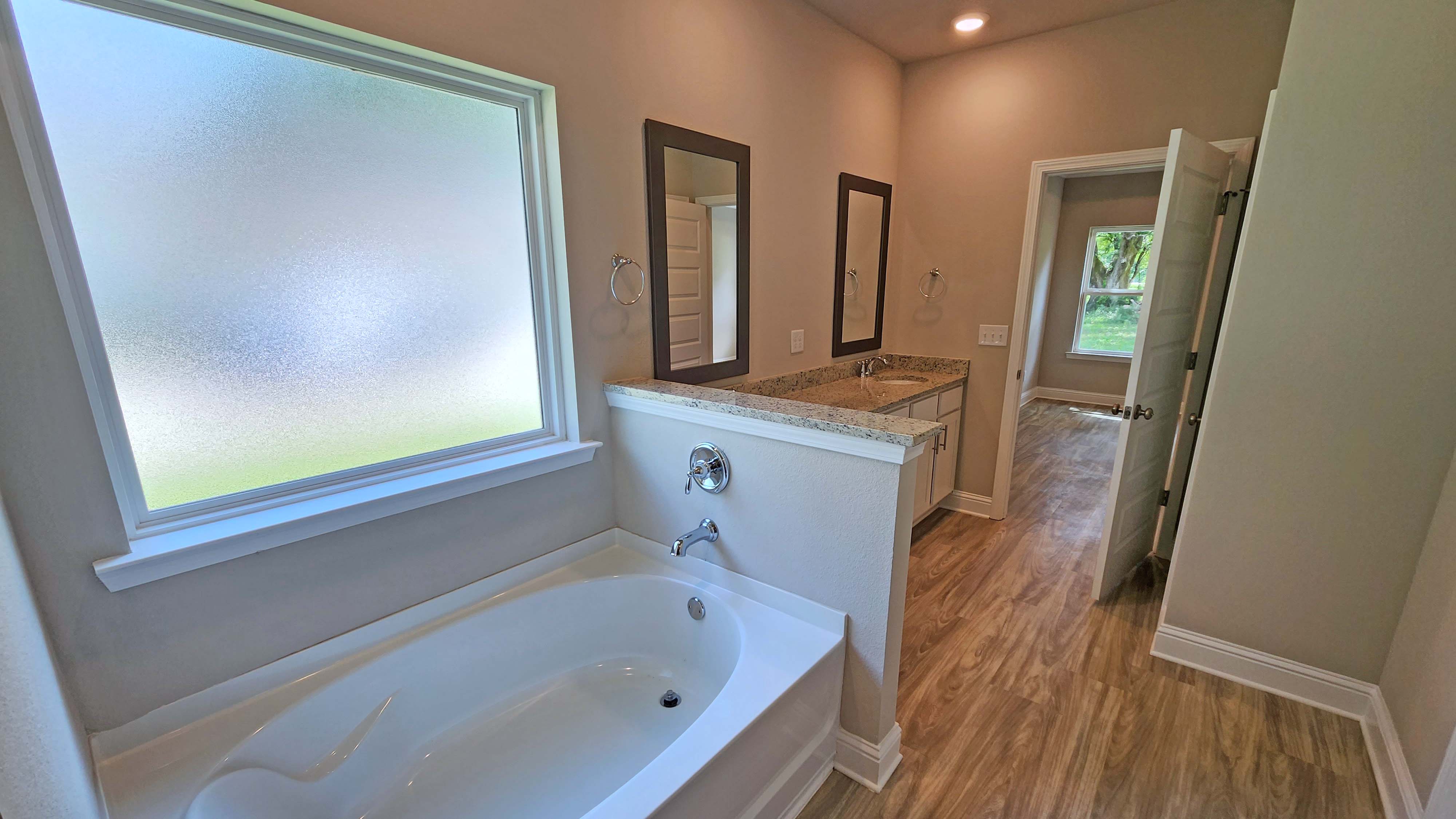 Soaking tub inside the primary bathroom