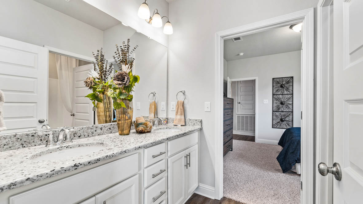 Bathroom with dual sink vanity.